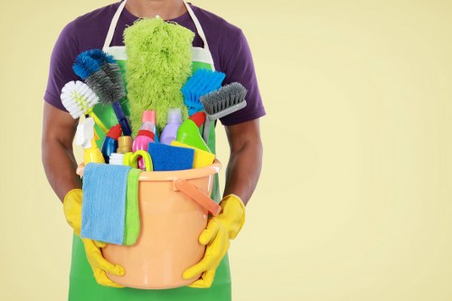 Professional cleaner treating a carpet stain in Wimbledon