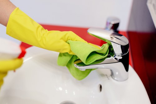 Deep cleaning in Wimbledon kitchen with detailed surface and appliance cleaning